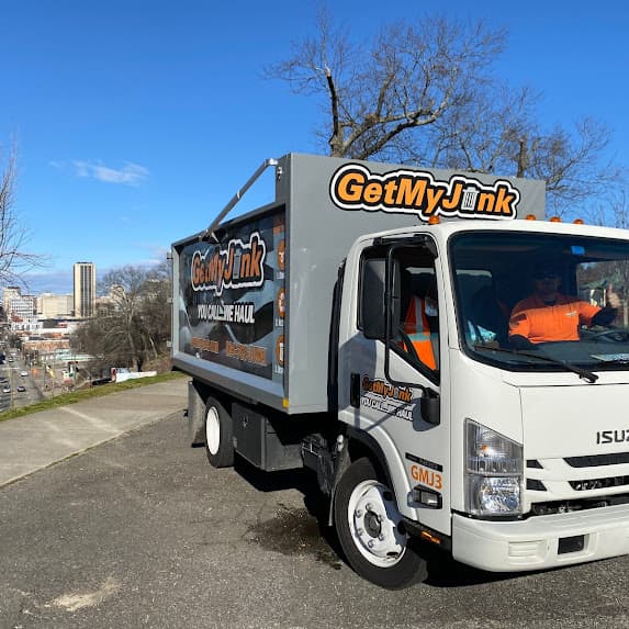Get My Junk Junk Removal Truck Richmond VA - Professional Junk Removal Services Get My Junk professional junk removal truck with Richmond Virginia skyline background - veteran-owned junk removal service serving Richmond, Henrico, Chesterfield, and surrounding areas